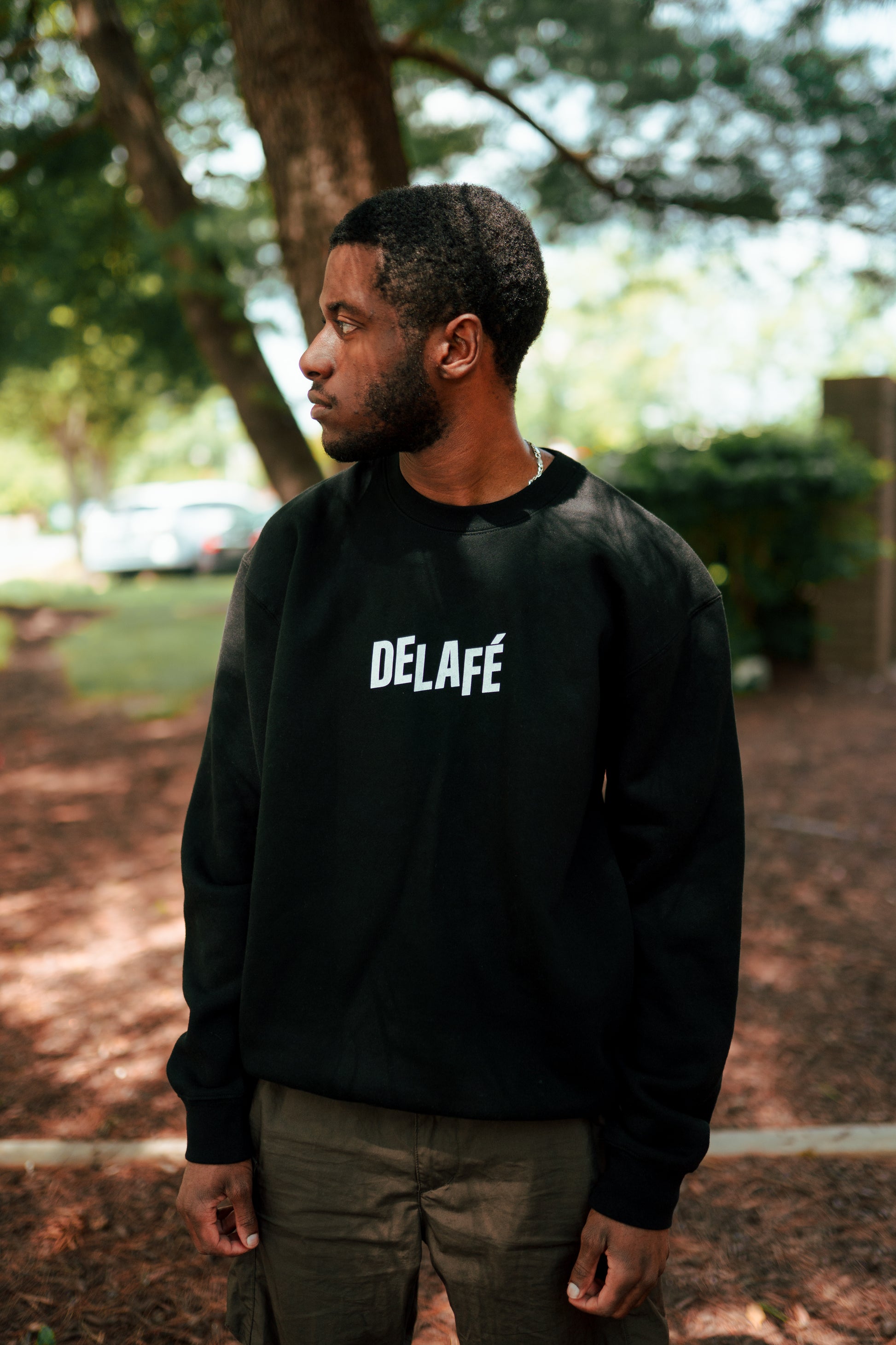 “Revelation 12:11” Crewneck