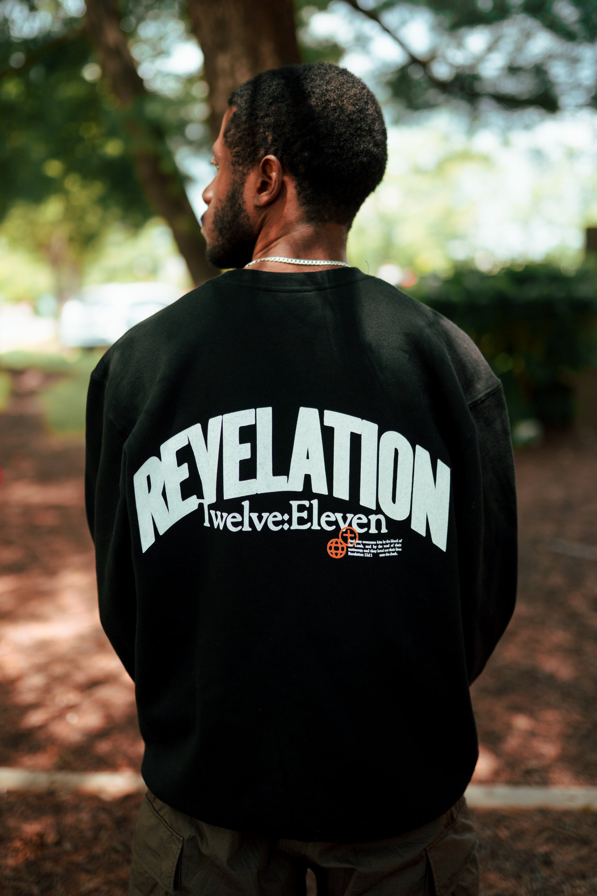 “Revelation 12:11” Crewneck